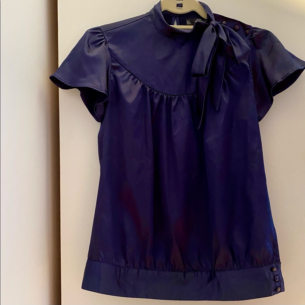 Silky navy blouse with bow tie neck